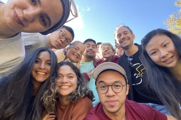 Students looking down at camera 
