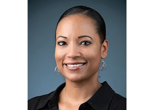 headshot of woman looking at camera