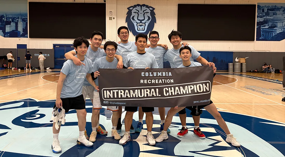 Shaoxun Liu is pictured with members of his basketball team.