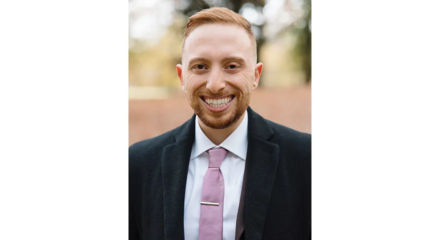 Photo of red-headed man smiling