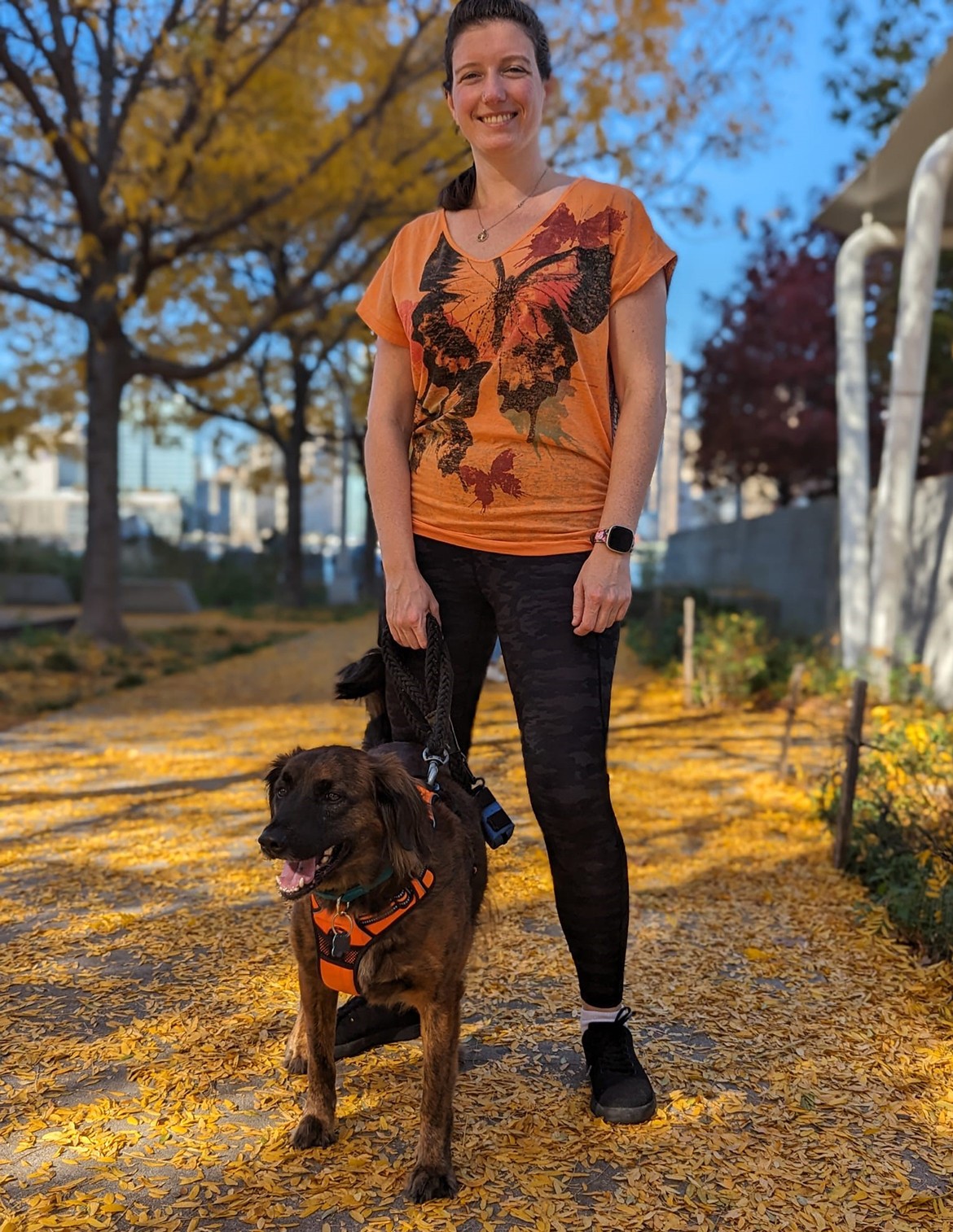 Carla Hoge is pictured walking her dog.