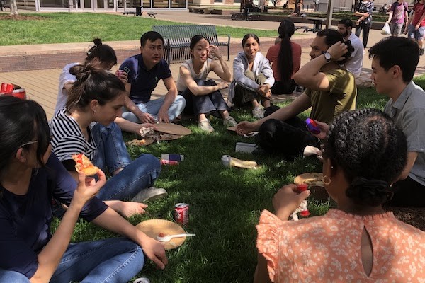 group of students having a picnic on campus