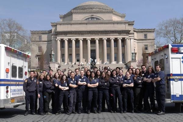 EMTs in front of a columbia building